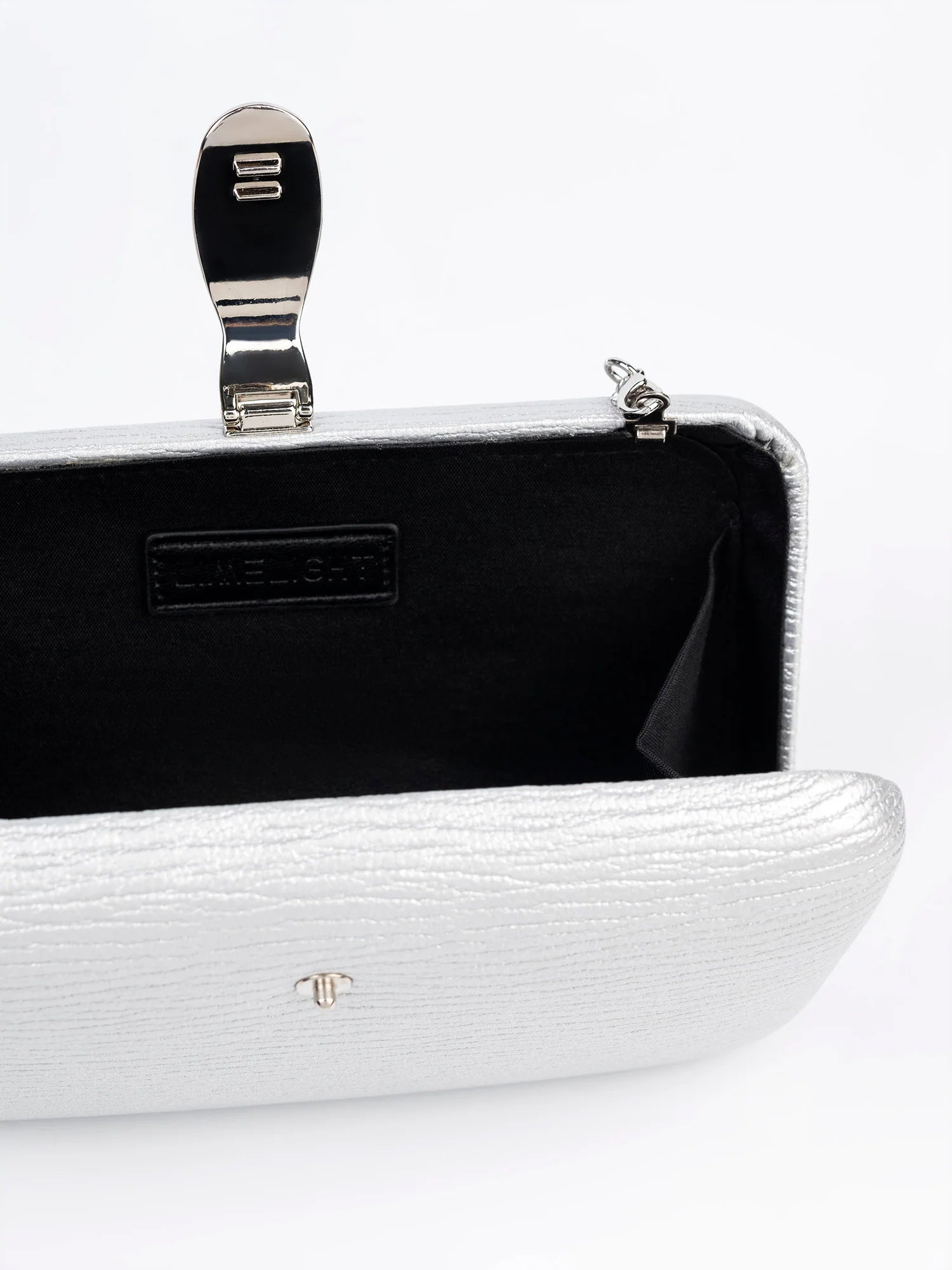 Tactile Finish Hand Clutch – Silver Rexine